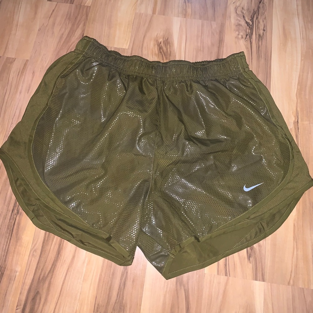 Green metallic Nike athletic shorts